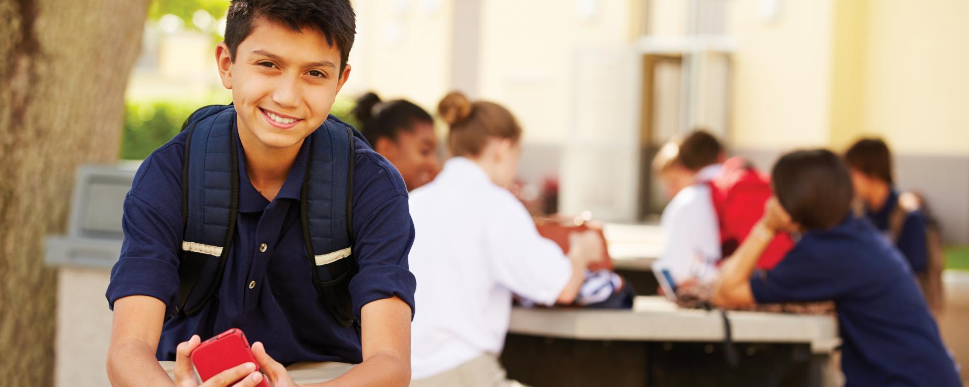 High school student with a phone