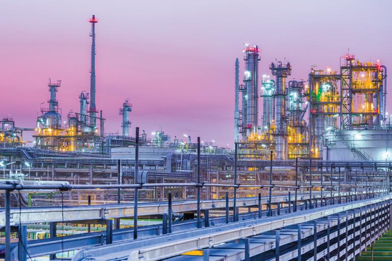 petrochemical plant in purple twilight